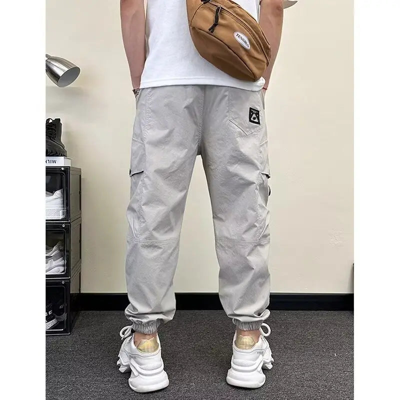 Spring Autumn New Fashion Elastic Waist Drawstring Pockets Men's Clothing Loose Korean Trend Bound Feet Simplicity Casual Pants voguable